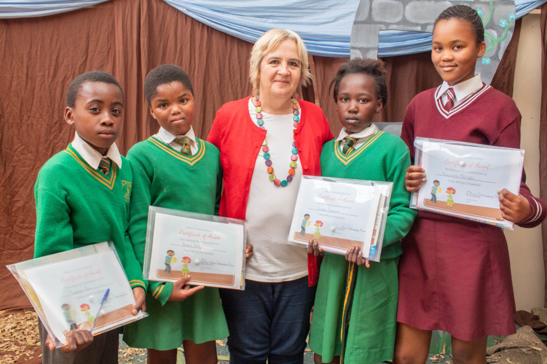 Some of the winners of the writing competition with Cathy Gush. Photo: Karabo Sylvester