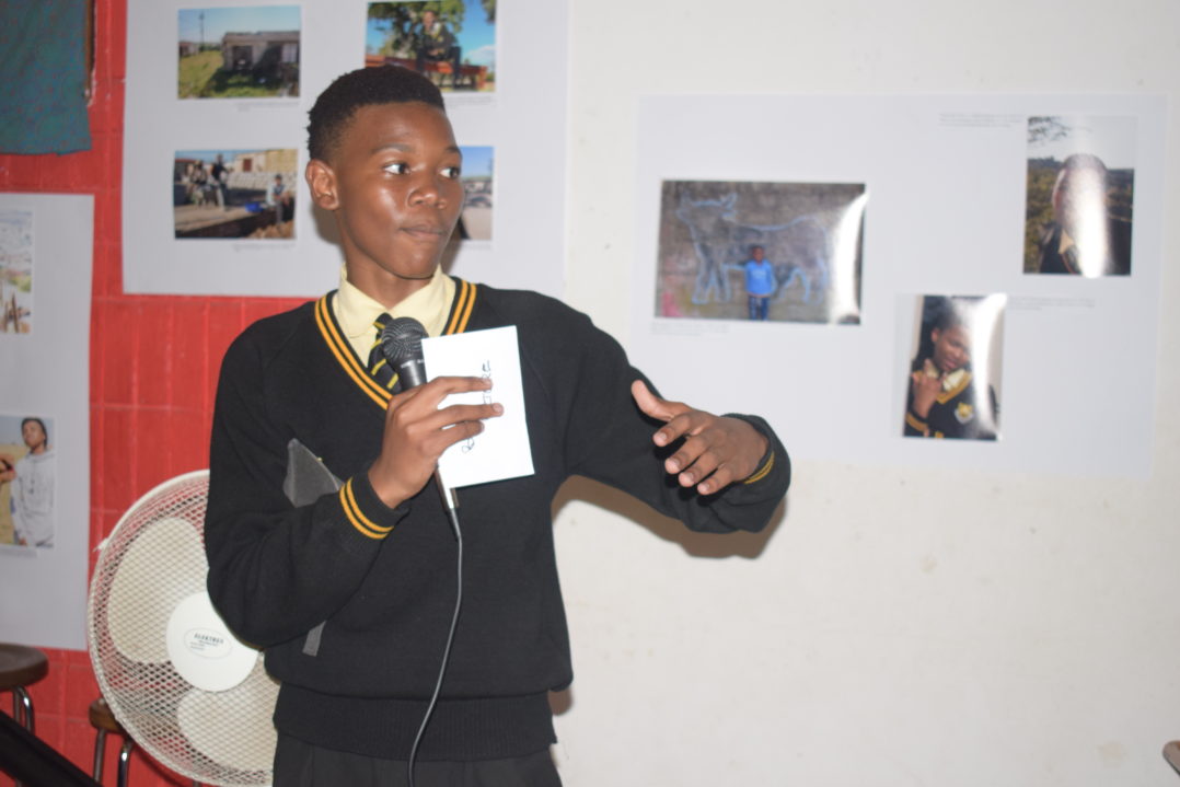 Chulumanco Kuhlane explains the motivations behind his award-winning collection of photographs at the Masazaneni Exhibition at the Joza Youth Hub last Friday. Photo: Michelle Banda