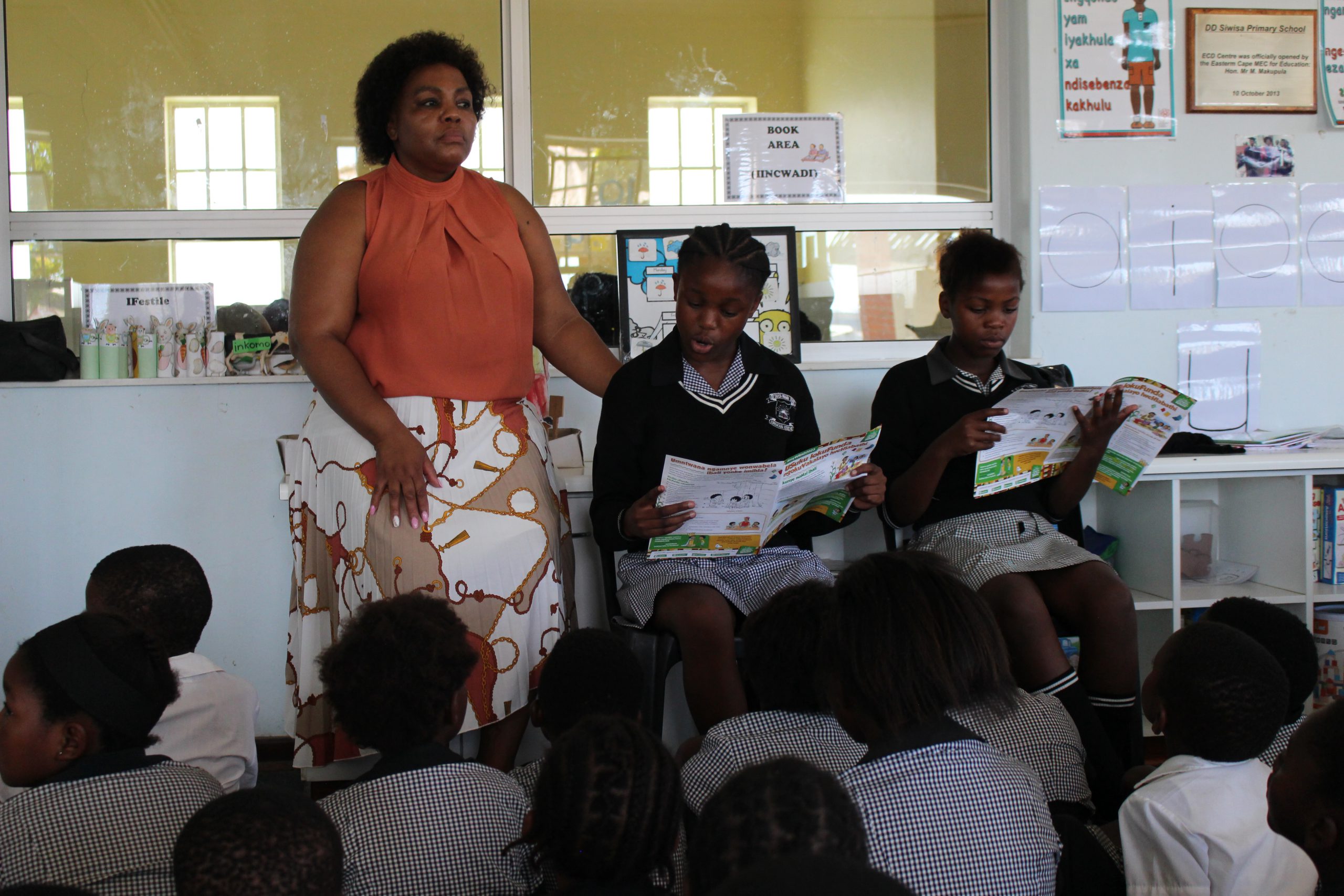 The grade 7s reading for the younger grades. Photo: Malikhanye Mankayi