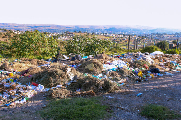 The area outside of Reseso Libi's house is used as a dumping site by neighbouring residents. Photo: Buhle Andisiwe Made
