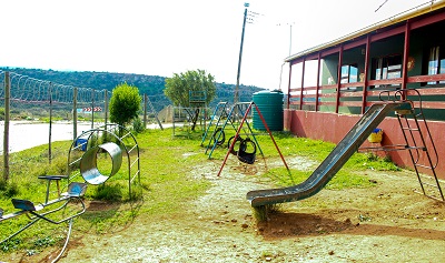 Playground in Wessels Edu-care centre opposite the open sewage system in Alicedale