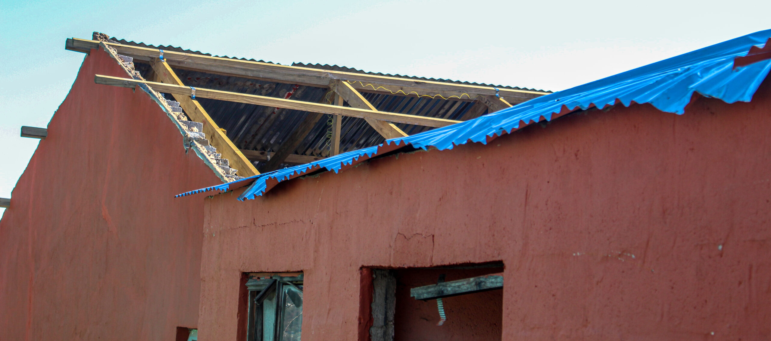 The roof that was blown of by the intense weather.