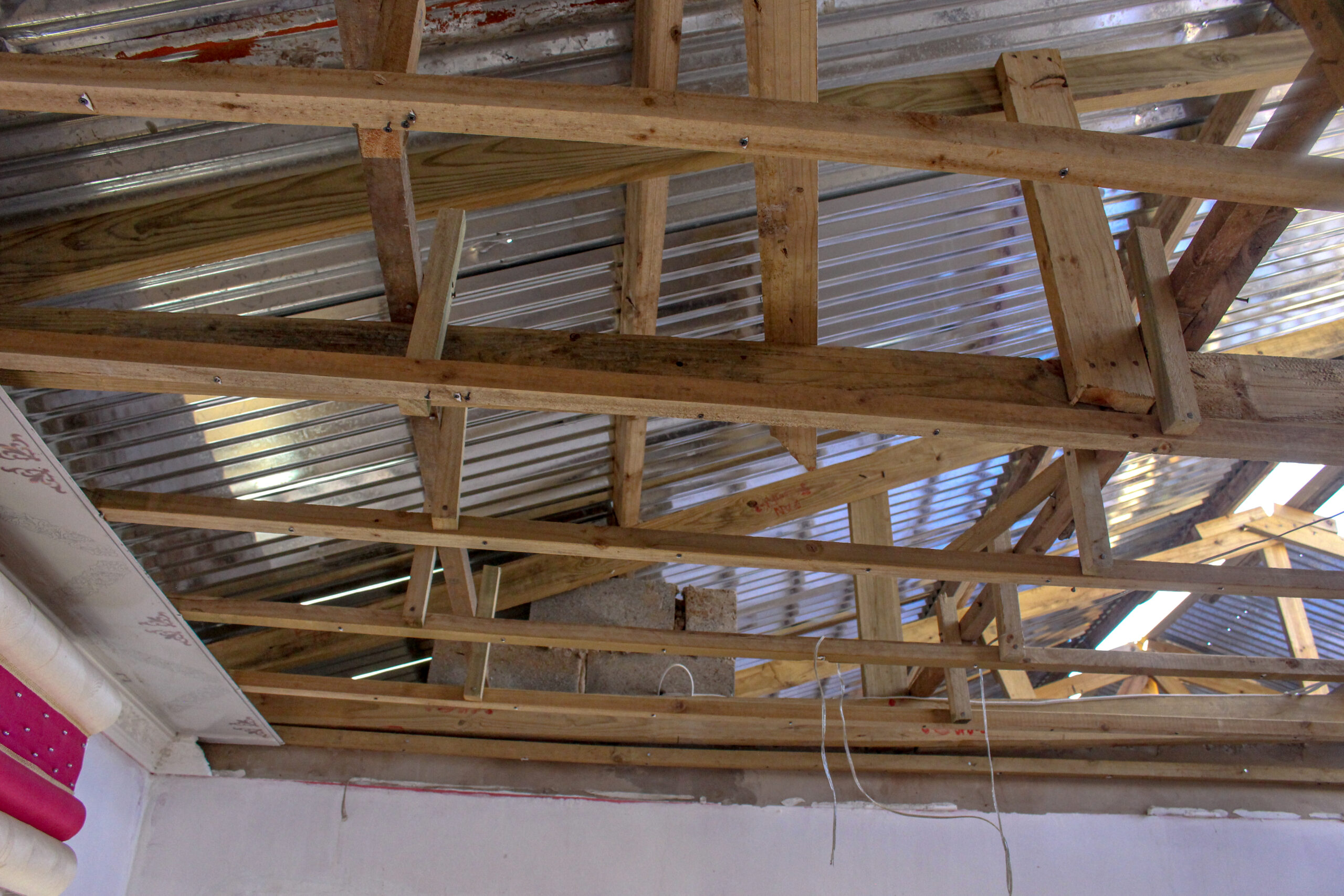 The ceiling damage inside the house that was caused by the intense weather.