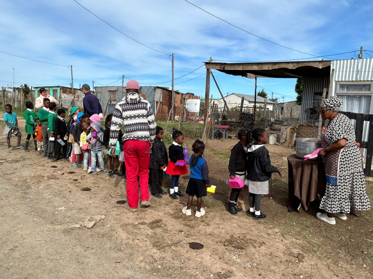 Limise Gagayi feeding the children. Photo: Mmathabo Maebela