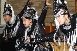 Jincheng pupils in a dance admiring the qualities of horses.