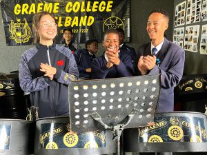 Boys from the Graeme College Steel band had enormous fun teaching pupils from Jincheng in China how to play their musical instruments