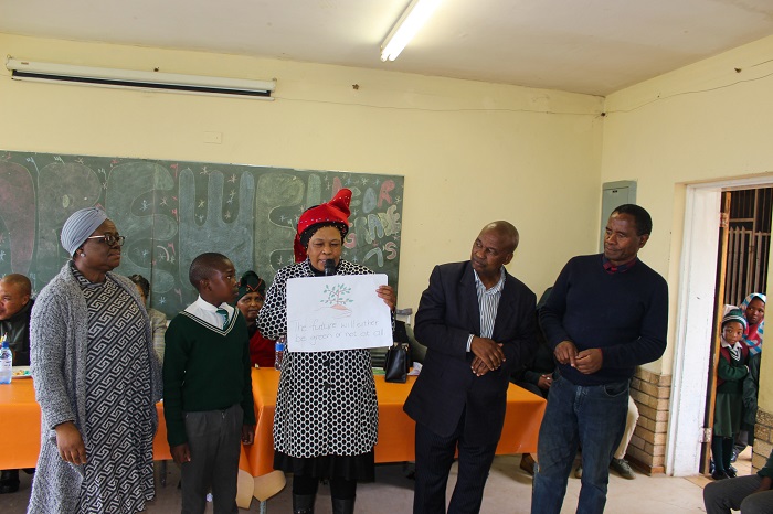 First position in drawing with Usiba members and Principal of the school on right hand side handing over wards . 