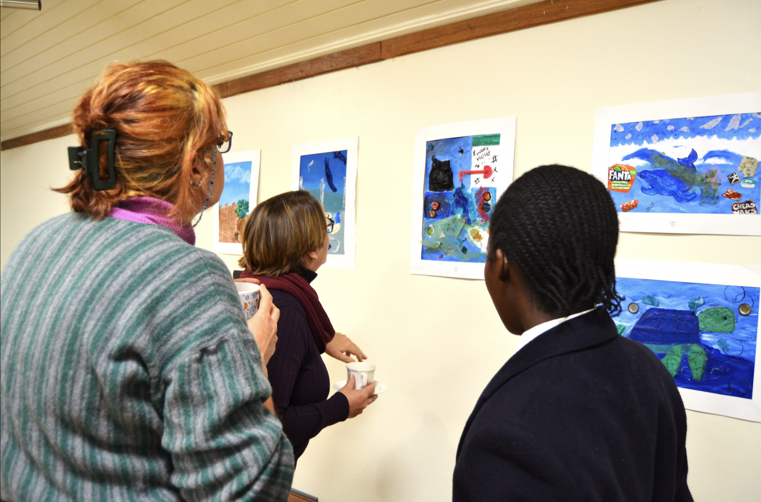 Art goes observing Plastic Pollution Exhibition. Photo: Siyamthanda Ndinisa.