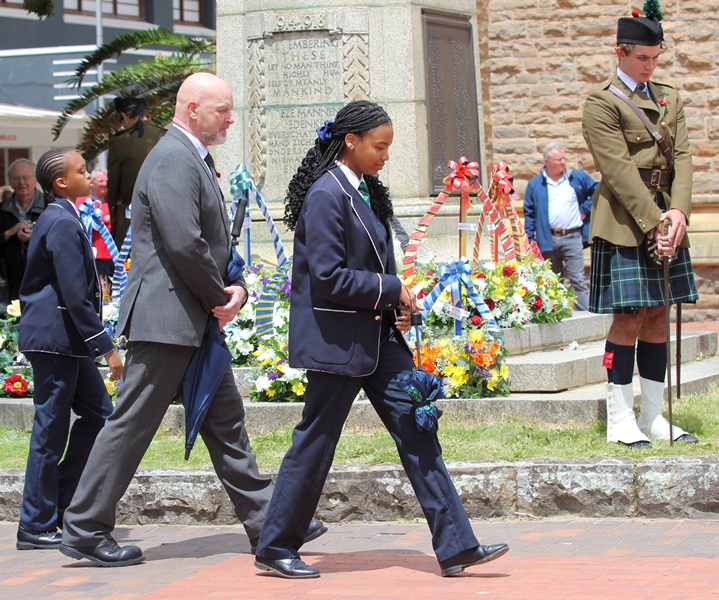 Victoria Girls High School principal, Warren Schmidt, and two pupils represented the school at the wreath laying