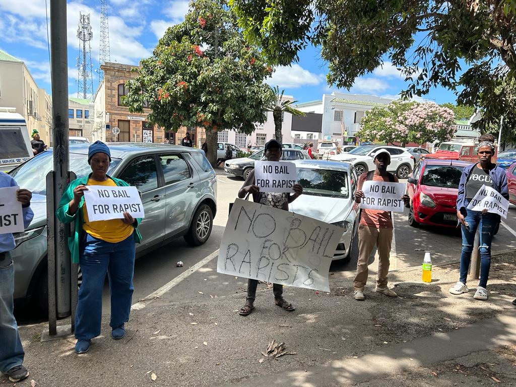 Community members outside the Makhanda Magistrates' Court protest for "no bail" to rape accused. Photo: Linda Pona