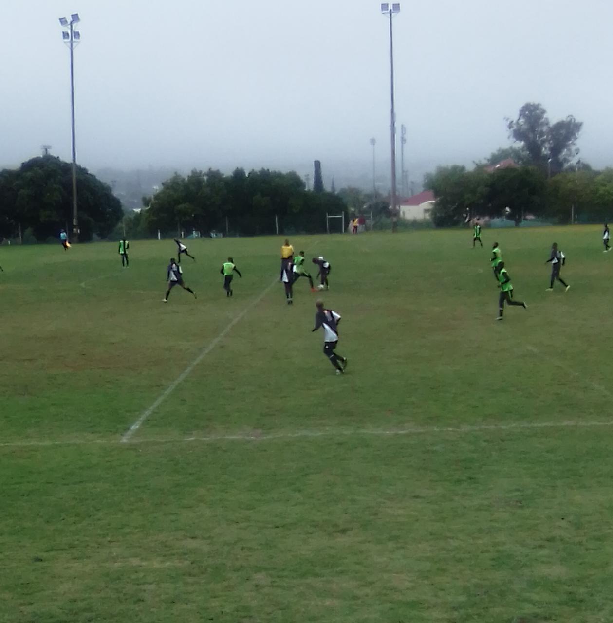 City Pirates (black) against Maru FC (lime) in their local derby. Photo: Chris Totobela
