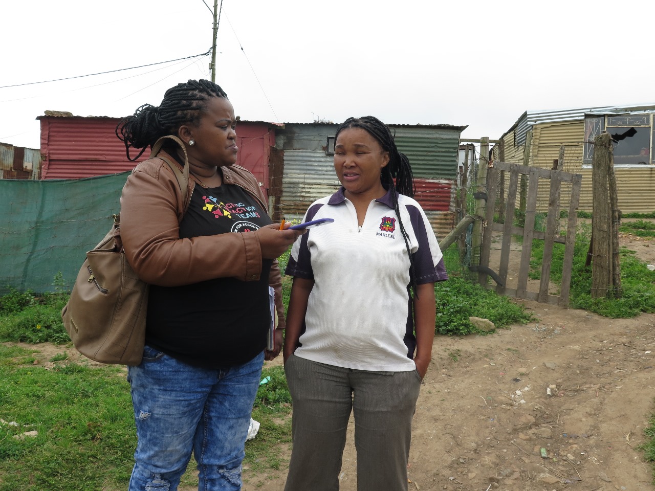 Lelethu Zono (left) interviewing Nicola Arends (right), Ward Committee member in Ghost Town and Sun City, Ward 3. Photo: Ntombentsha Yamiso