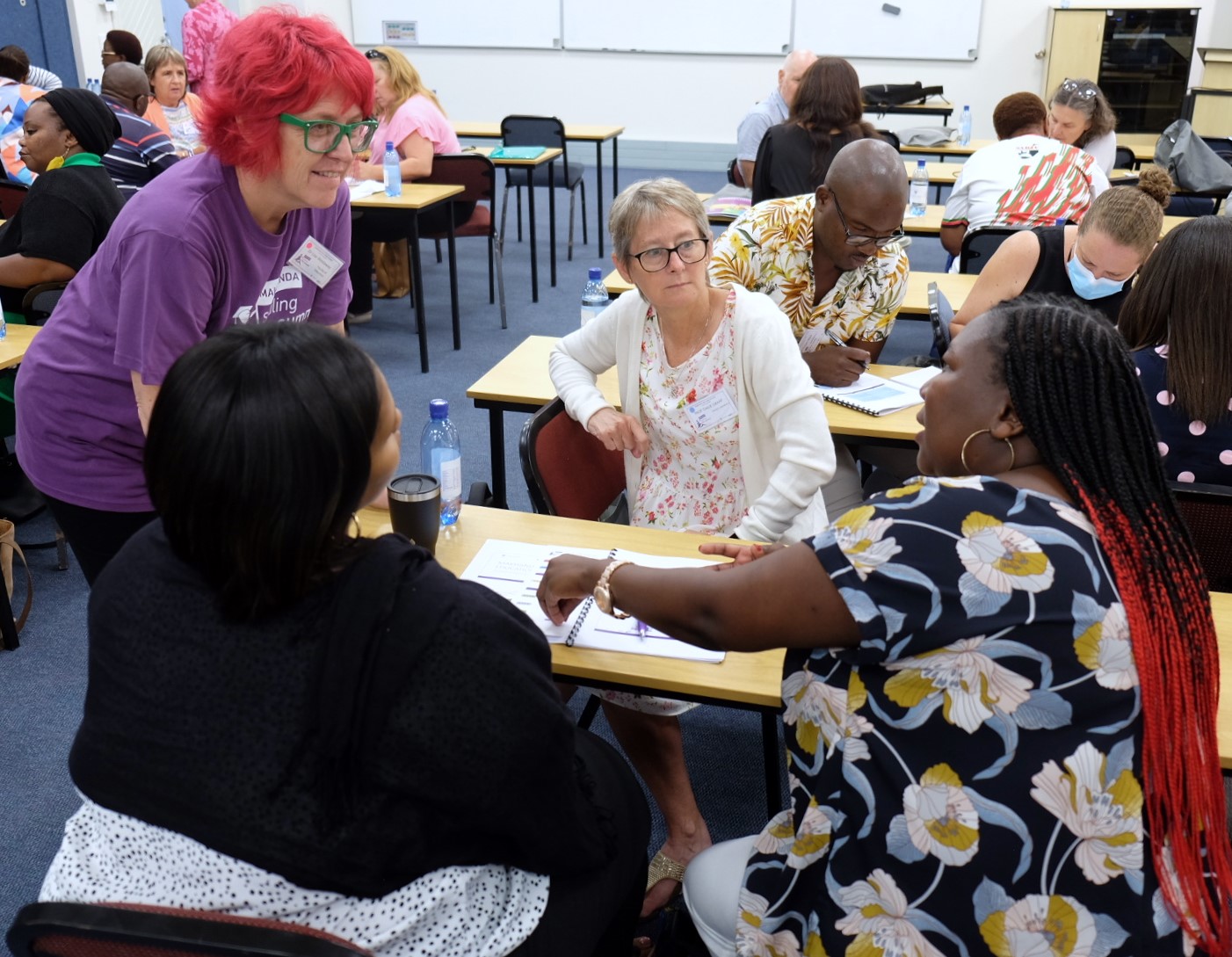 Facilitator Dr Lise Westaway, head of the Rhodes Department of Primary and Early Childhood Education, checks in on a group of delegates at the primary education breakaway group at the Makhanda Education Summit from 27-28 January.