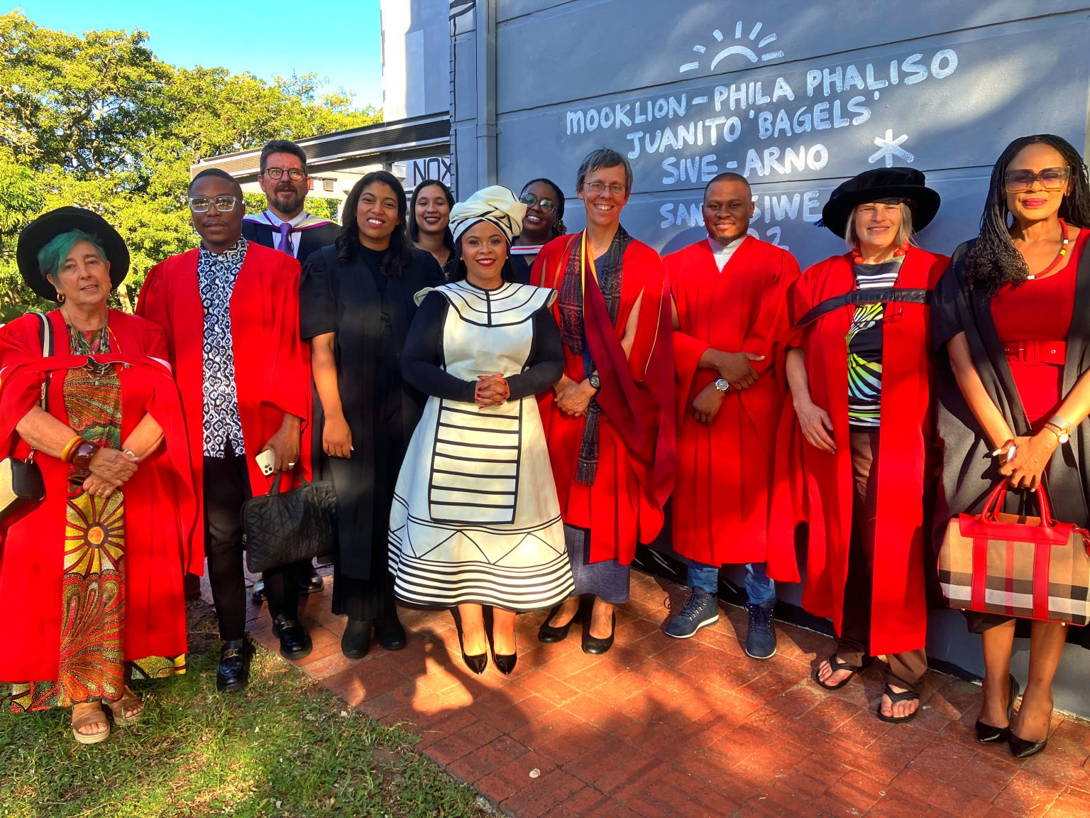 Academics from Rhodes University's School of Journalism and Media Studies at the Africa Media Matrix before the walk to Barratt Lecture Hall. Photo: Steven Lang