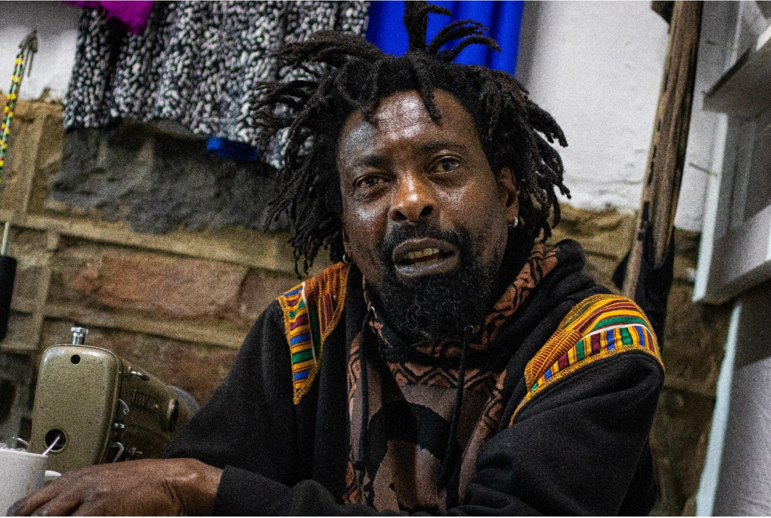 Isaias Tiyane talks about his work during an interview at his clothing store on Dundas, where he operates. Photo: Siqhamo Jama