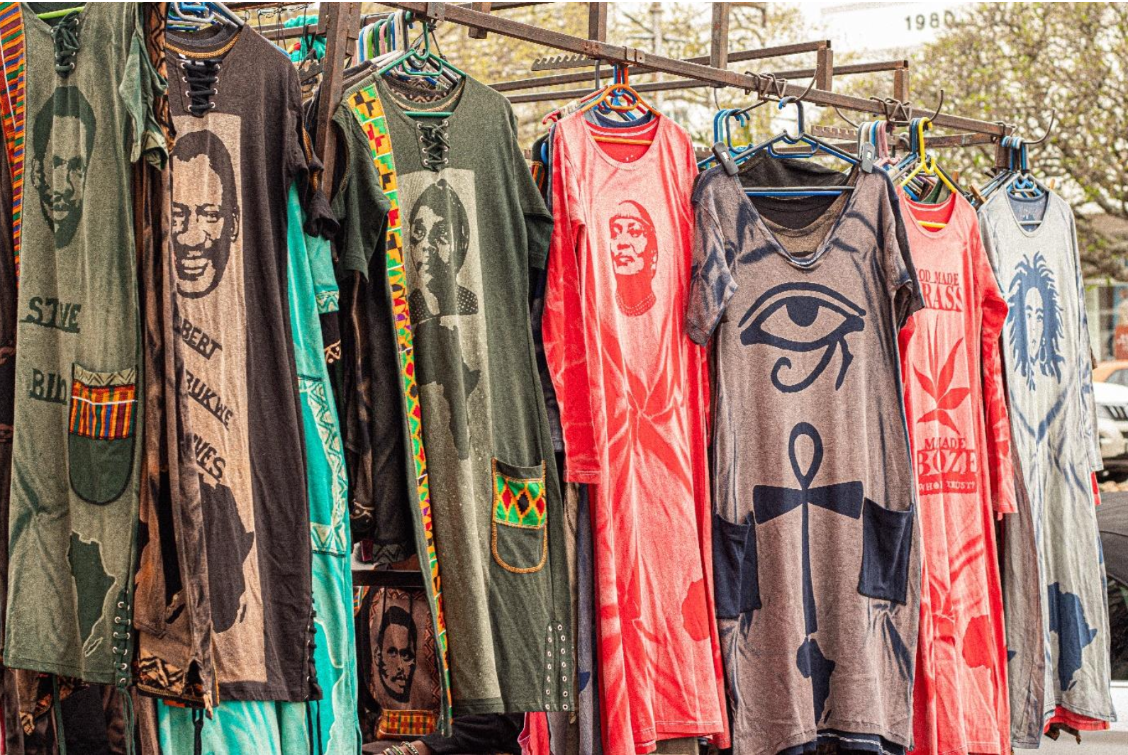 On display, beautiful handmade Rhandzanani Movement Clothing dresses. When the weather permits, you can find Isaias on the corner of High Street and Cuyler Street. Photo: Siqhamo Jama