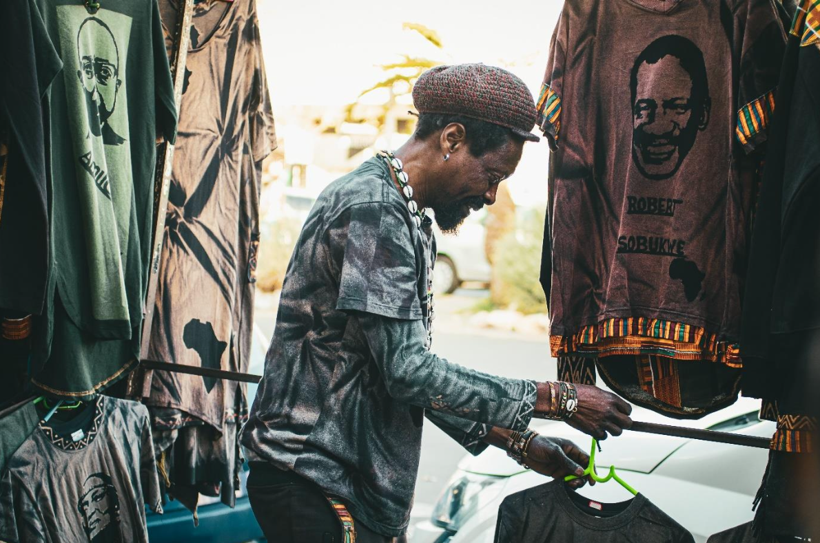 Isaias packs up after a busy day at his stall on High Street. Photo: Siqhamo Jama