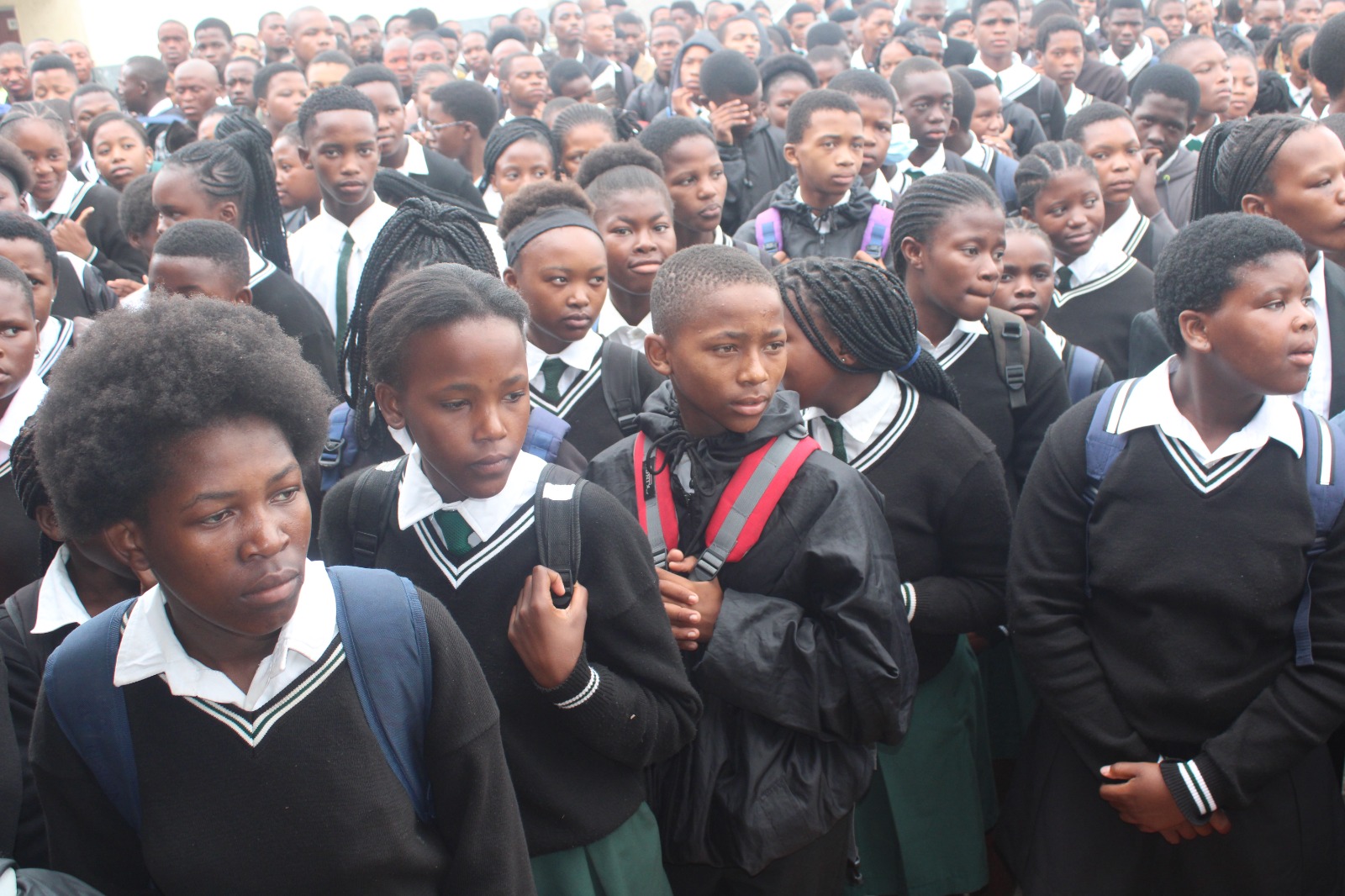 TEM Mrwetyana High School listening attentively to Social Development MEC Bukiwe Fanta's address at the school on Thursday. Photo by Luvuyo Mjekula