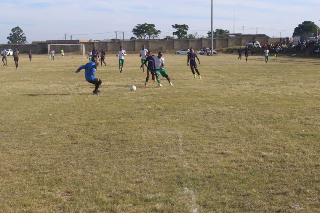 Sipho "Obua" Rawana shielding off Maru FC attacker. Photo: Chris Totobela