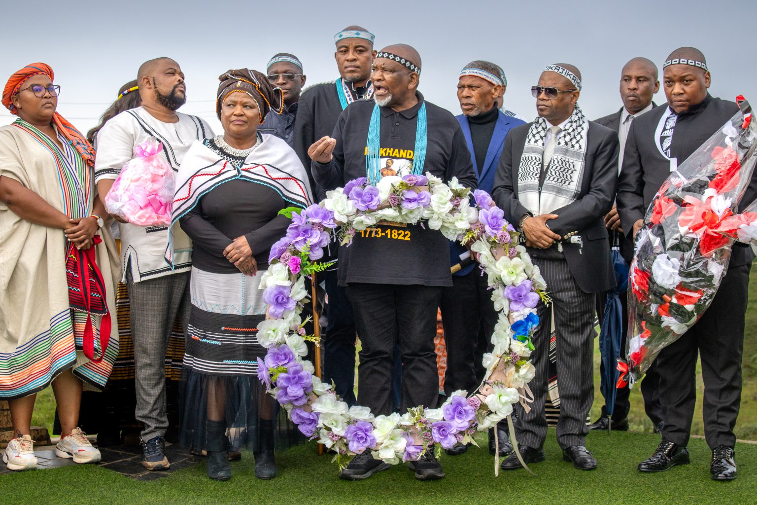 Makana Municipality councillor, Ramie Xonxa, centre, delivering a speech during a wreath-laying ceremony at the Egazini Battlefield in Makhanda, where thousands of Xhosa soldiers perished during the Battle of Egazini more than 200 years ago. Picture: Sibongiseni Maphumulo