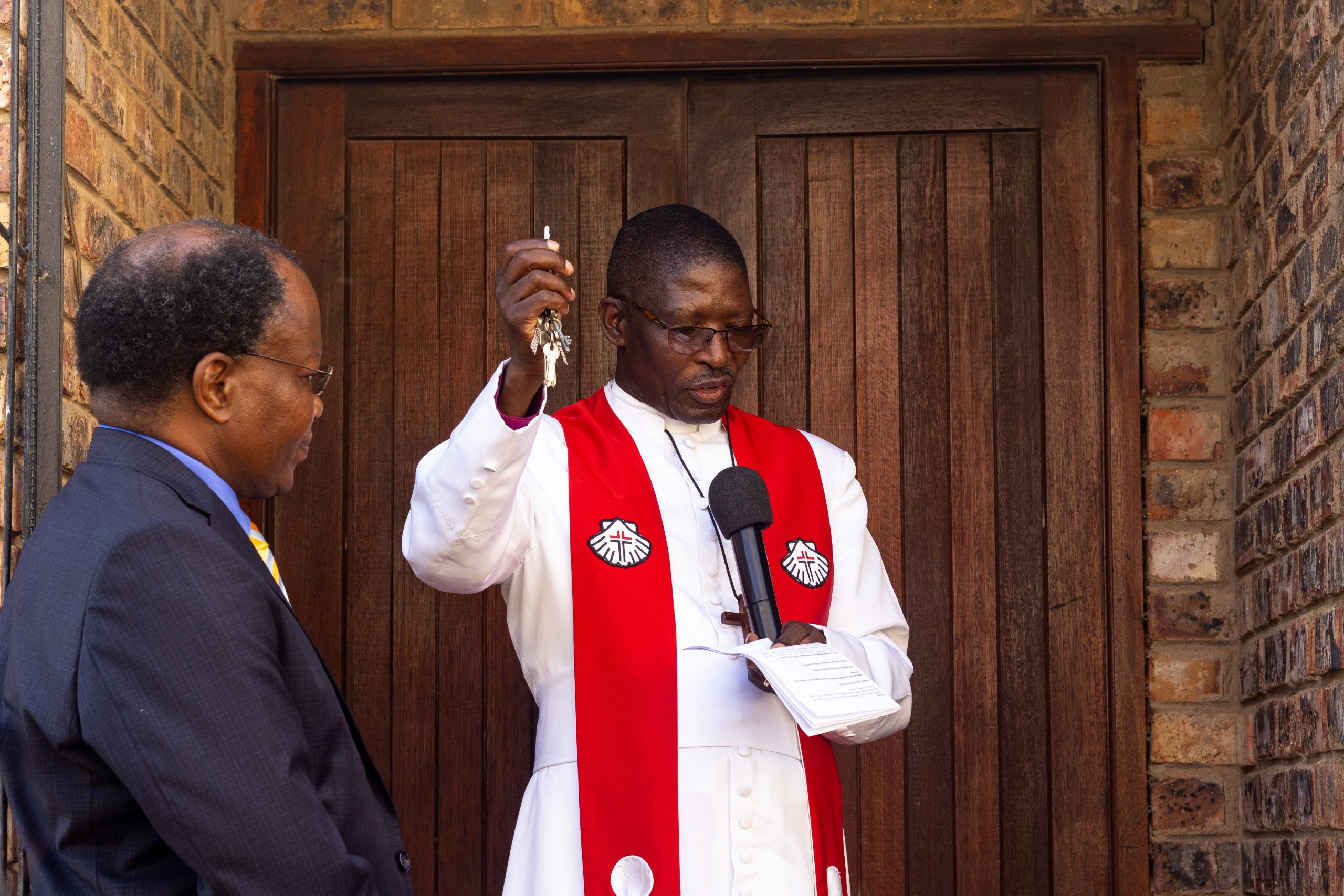 Bishop Dr. Msokoli William Leleki blessing the hall after the unveiling the new Mluleki Raymond Ndabeni Hall photo by RIkie Lai