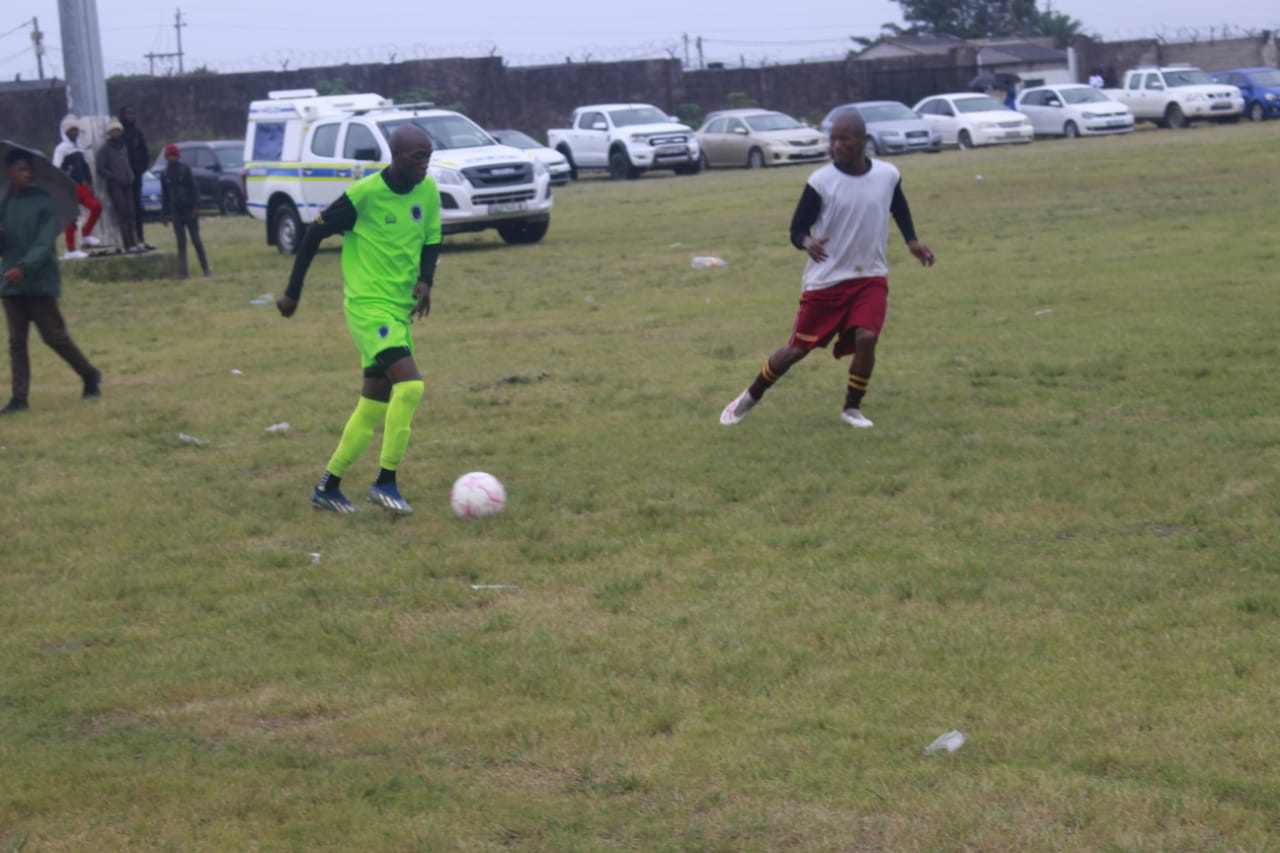 Inga Madyo of Maru FC taking on an Attackers defender