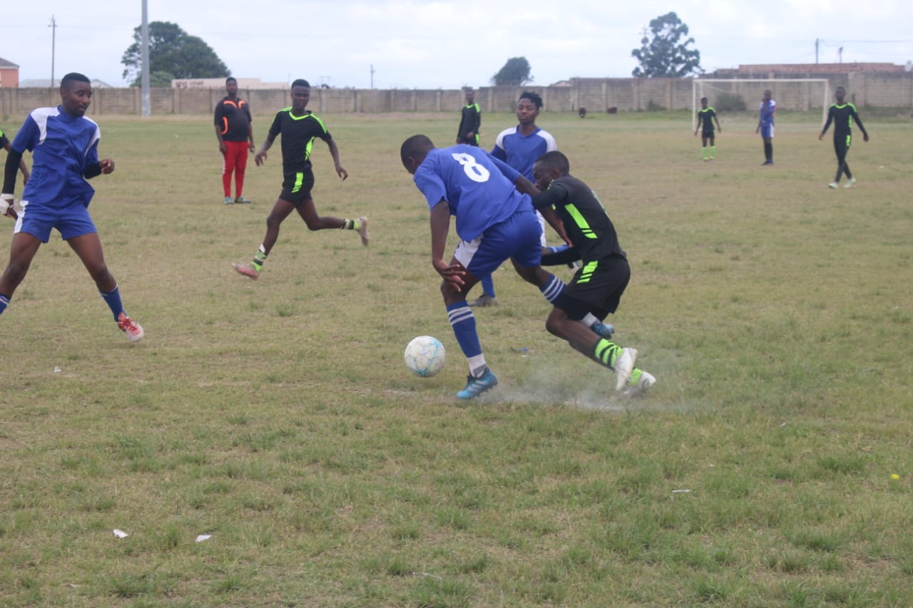 Love and Peace defender shielding off a Sophia Stars attacker. Photo: Chris Totobela