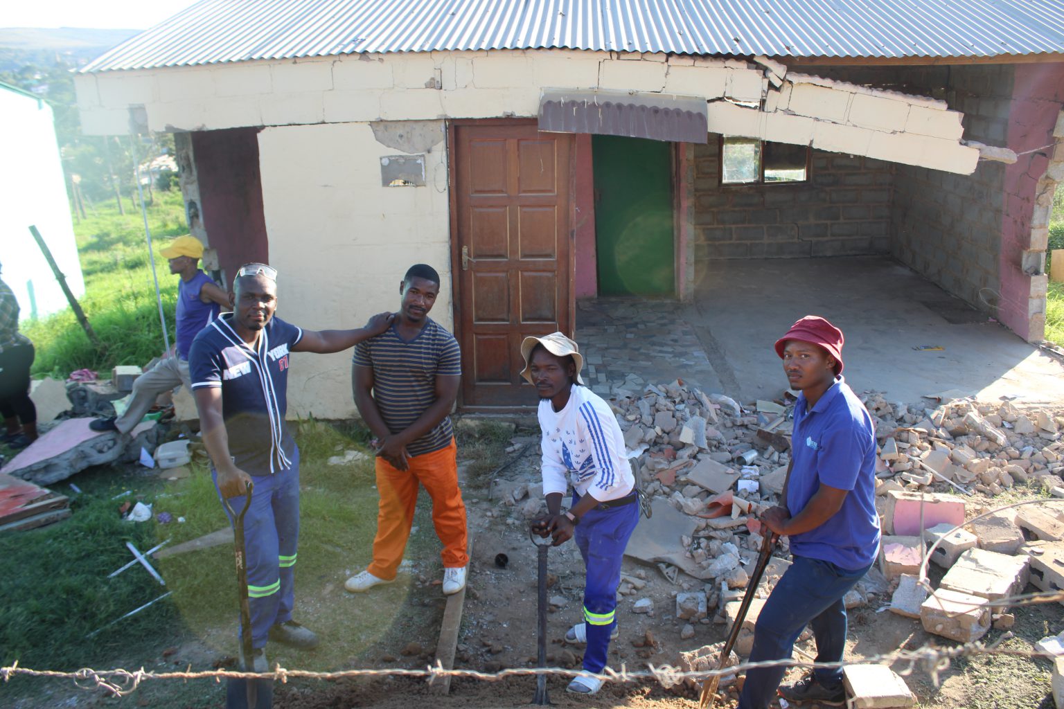 From left to right, Bayanda Mawaka, Aphelele Botha, Siya Tinise and Simnolele Botha, putting their apprenticeship skills to good use by helping rebuild the RDP house destroyed in the fatal taxi accident in “O” Street at the weekend. Photo: Luvuyo Mjekula