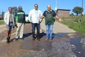 Richard Alexandra with Monwabisi Tame, Michael Beaumont with Athol Trollip talking about the sewage and water links.