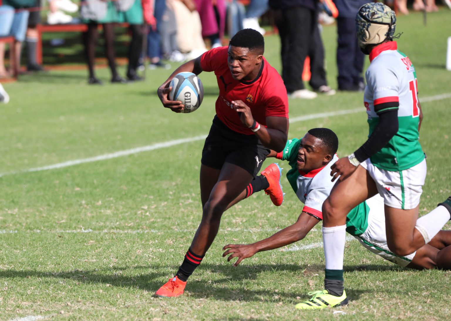 Likhona Kepe avoids a tackle in front of the Kingswood College try line, 1st XV against Brandwag. Kingswood went on to win 33-0. Photo: Jackie Clausen