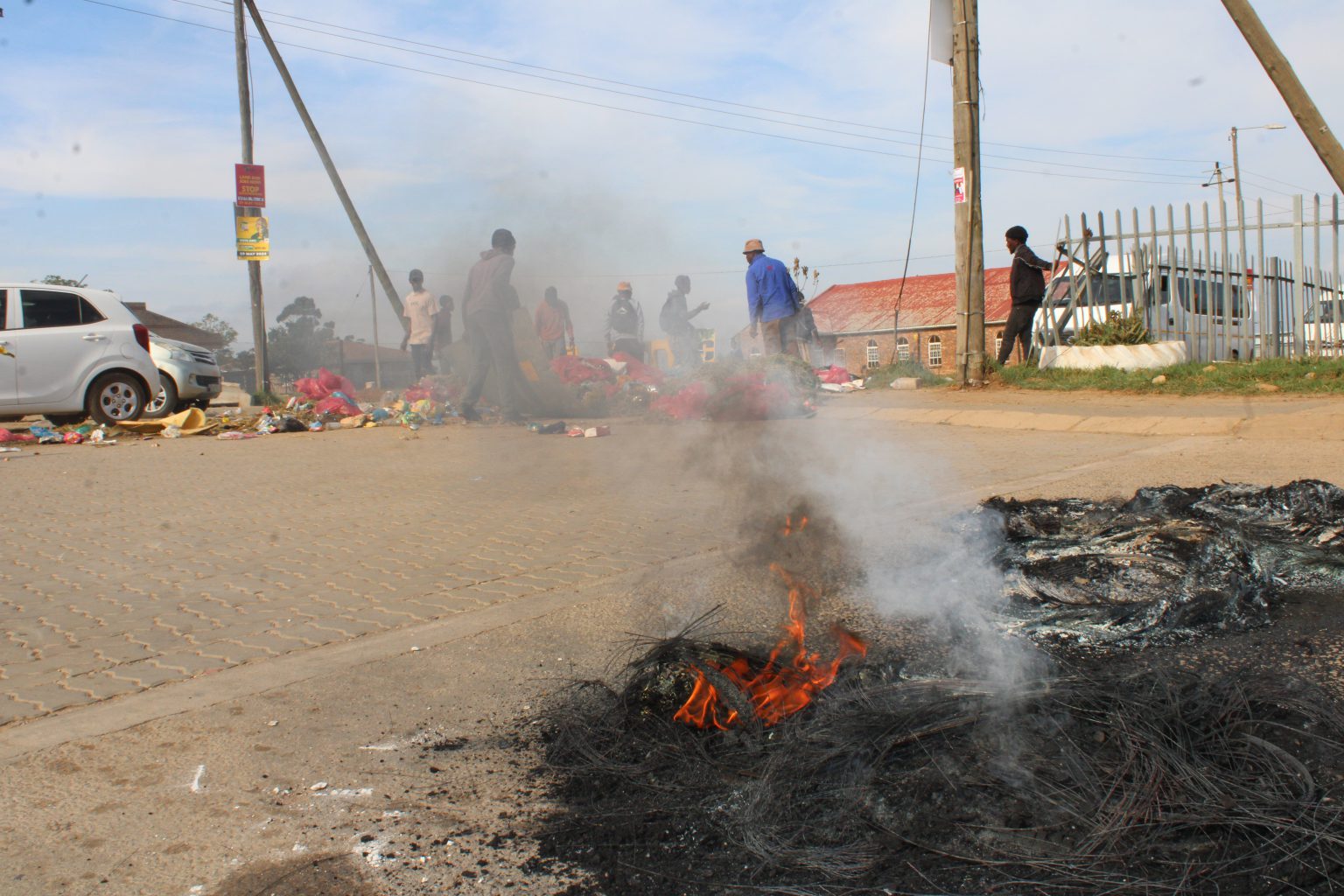 There were chaotic scenes in Joza on Thursday as workers in the Ncame Street upgrade, who claimed they had not been paid for two months., demonstrated at the site. Photo: Luvuyo Mjekula