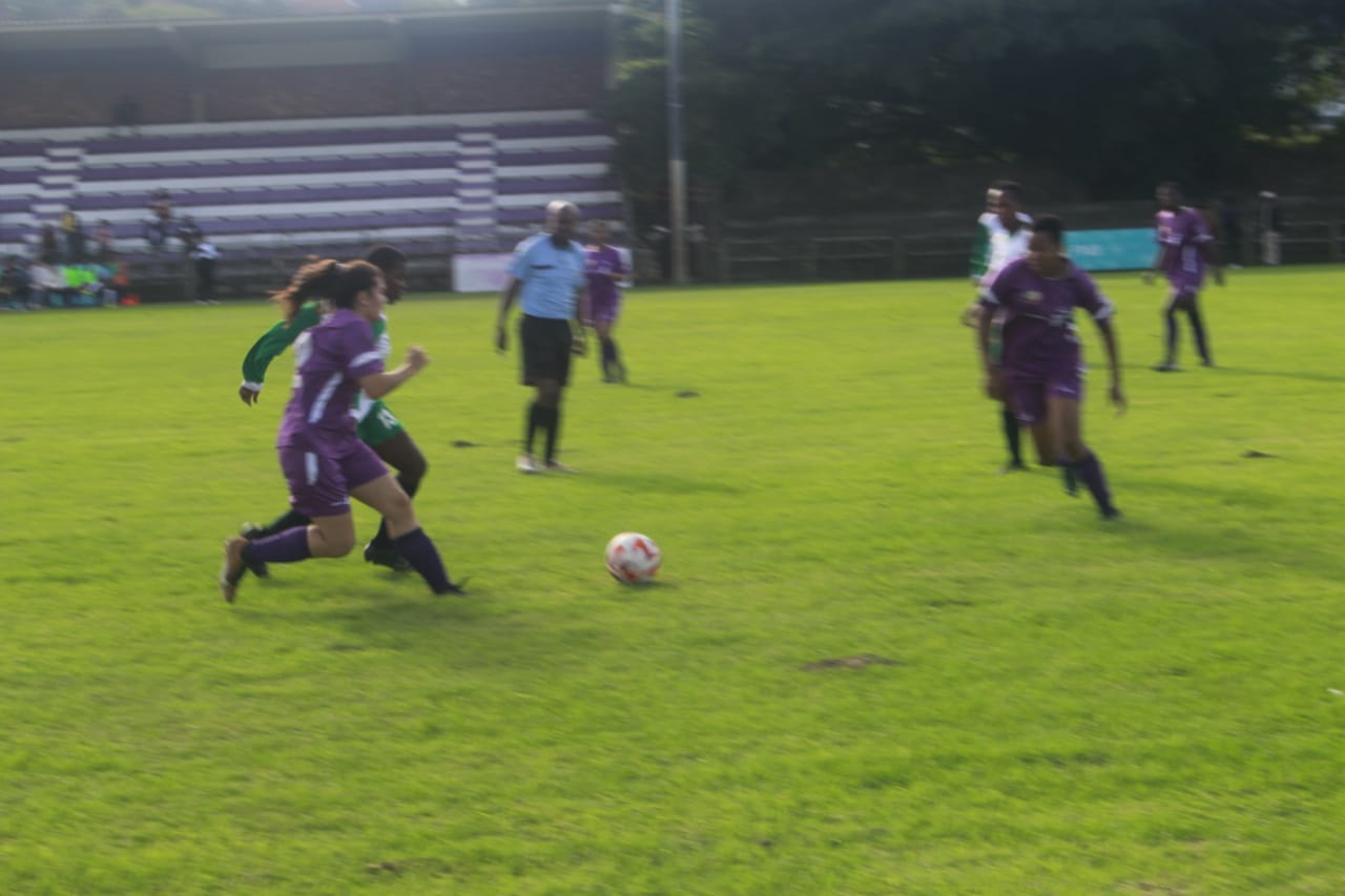 Naira Abbott of RU tussling for the ball with Galaxy defender