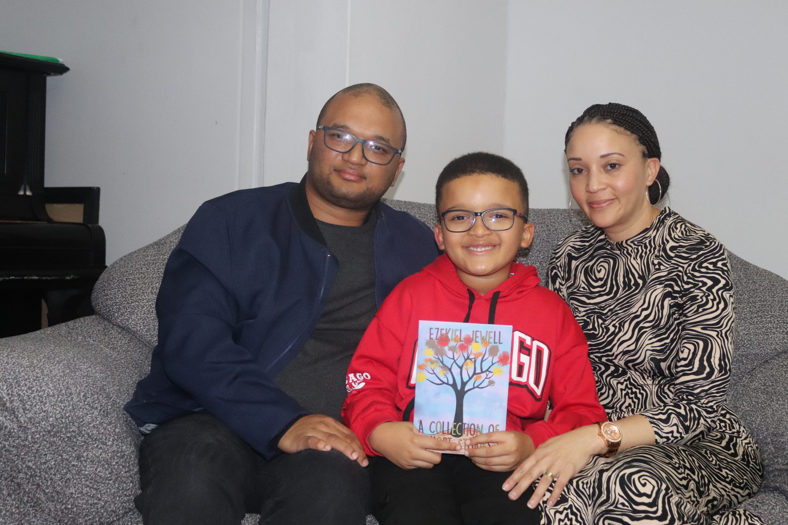 Ezekiel and his parents, Sherilize and Slyvester at their home, 30 May 2024. Photo: Khanyisa Khenese