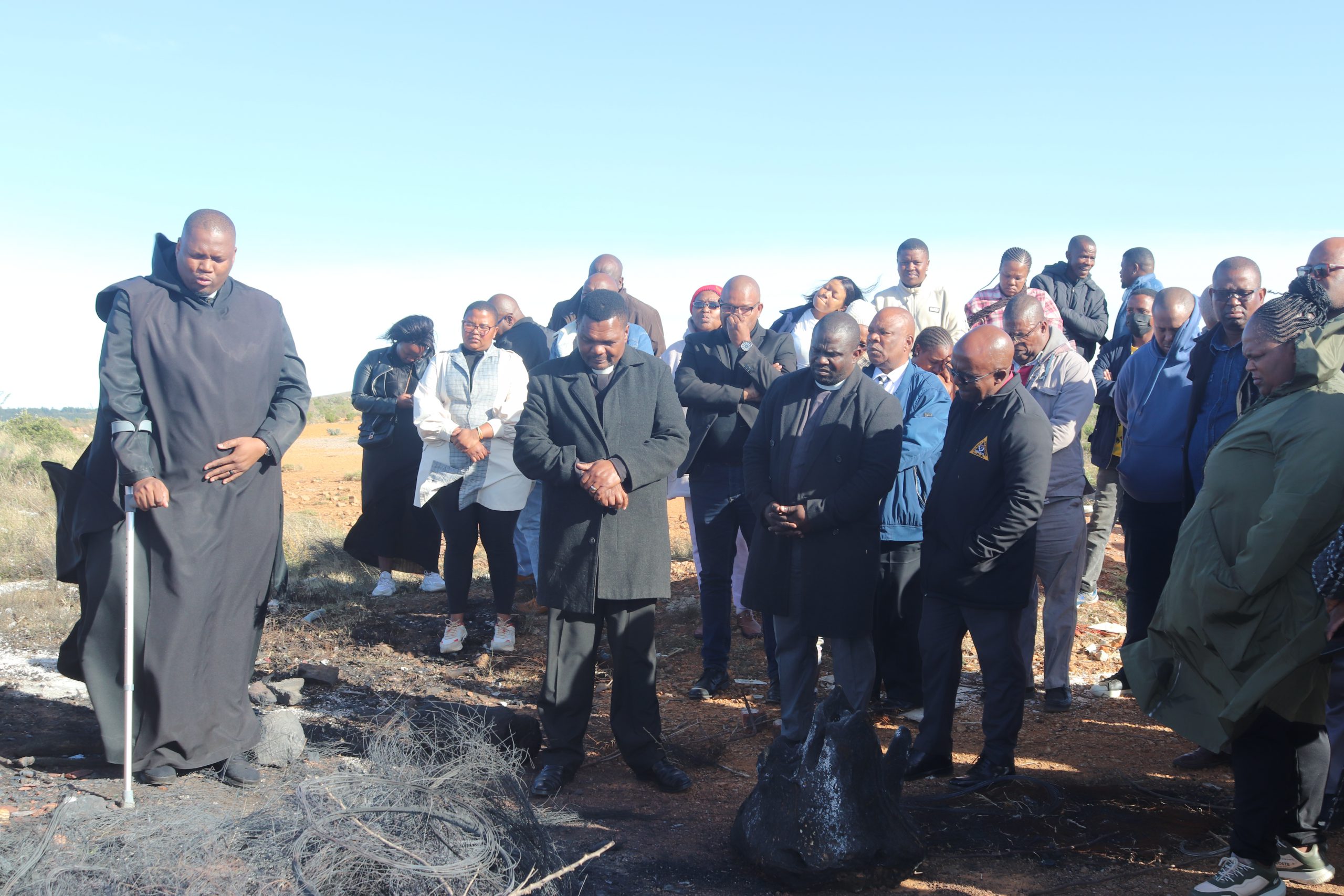 The local religious fraternity holding a prayer for Kungawo at eBakhweteni field. Photo: Khanyisa Khenese