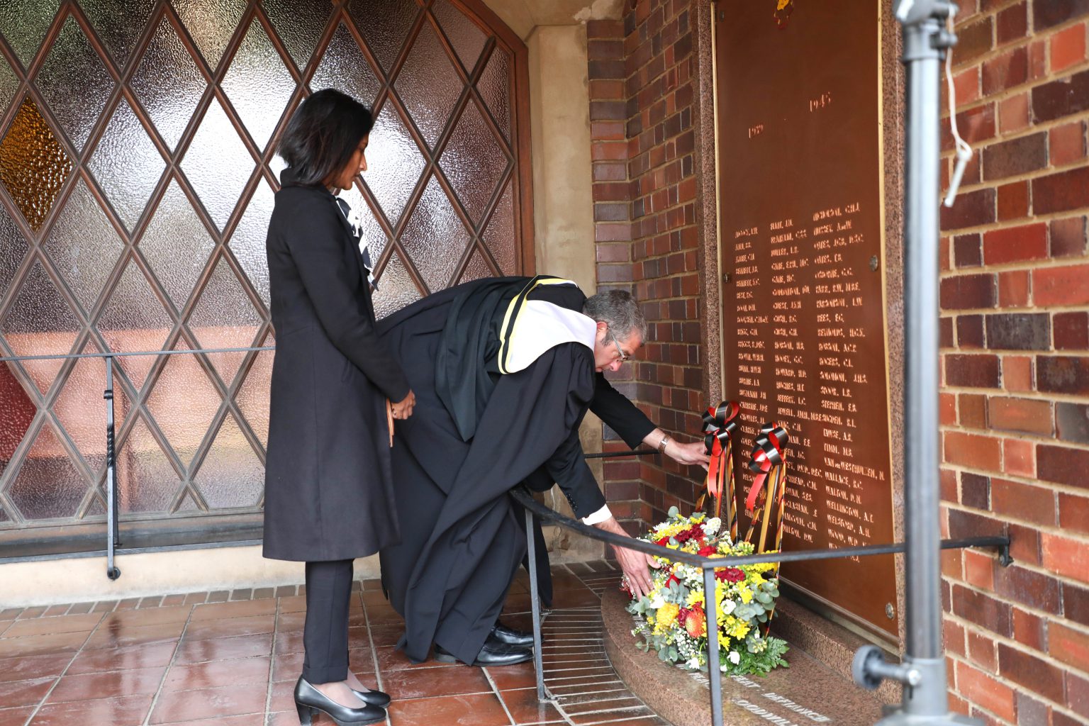 Kingswood College head Leon Grové and chair of Council, Kesentri Govender, laying a wreath at the Wall of Remembrance. Photo: Jackie Clausen