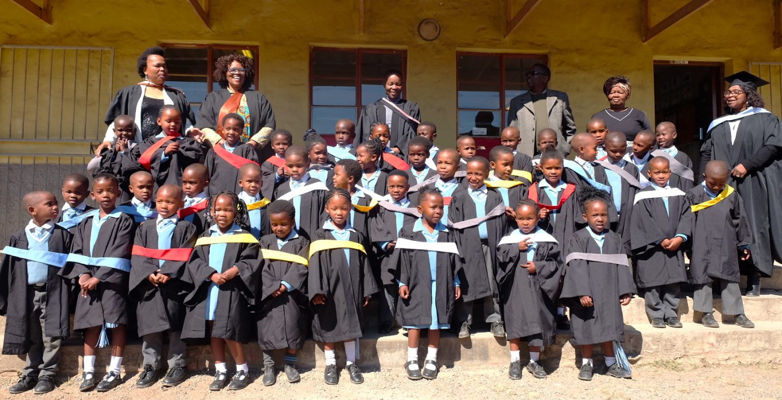 Archie Mbolekwa Grade Rs show off their academic regalia as they graduated to Grade 1 at a heart-warming ceremony at the school last week. Photo: Rod Amner