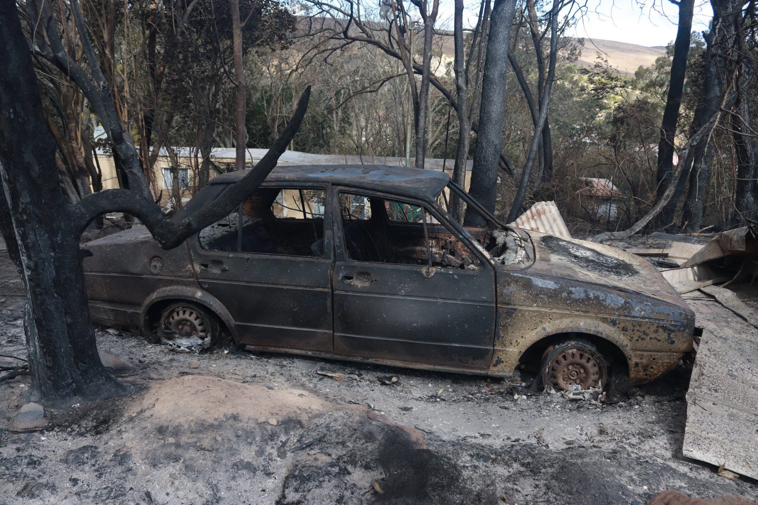 This vehicle was parked next to the home razed by a wildfire in Makhanda yesterday. Photo: Khanyisa Khenese