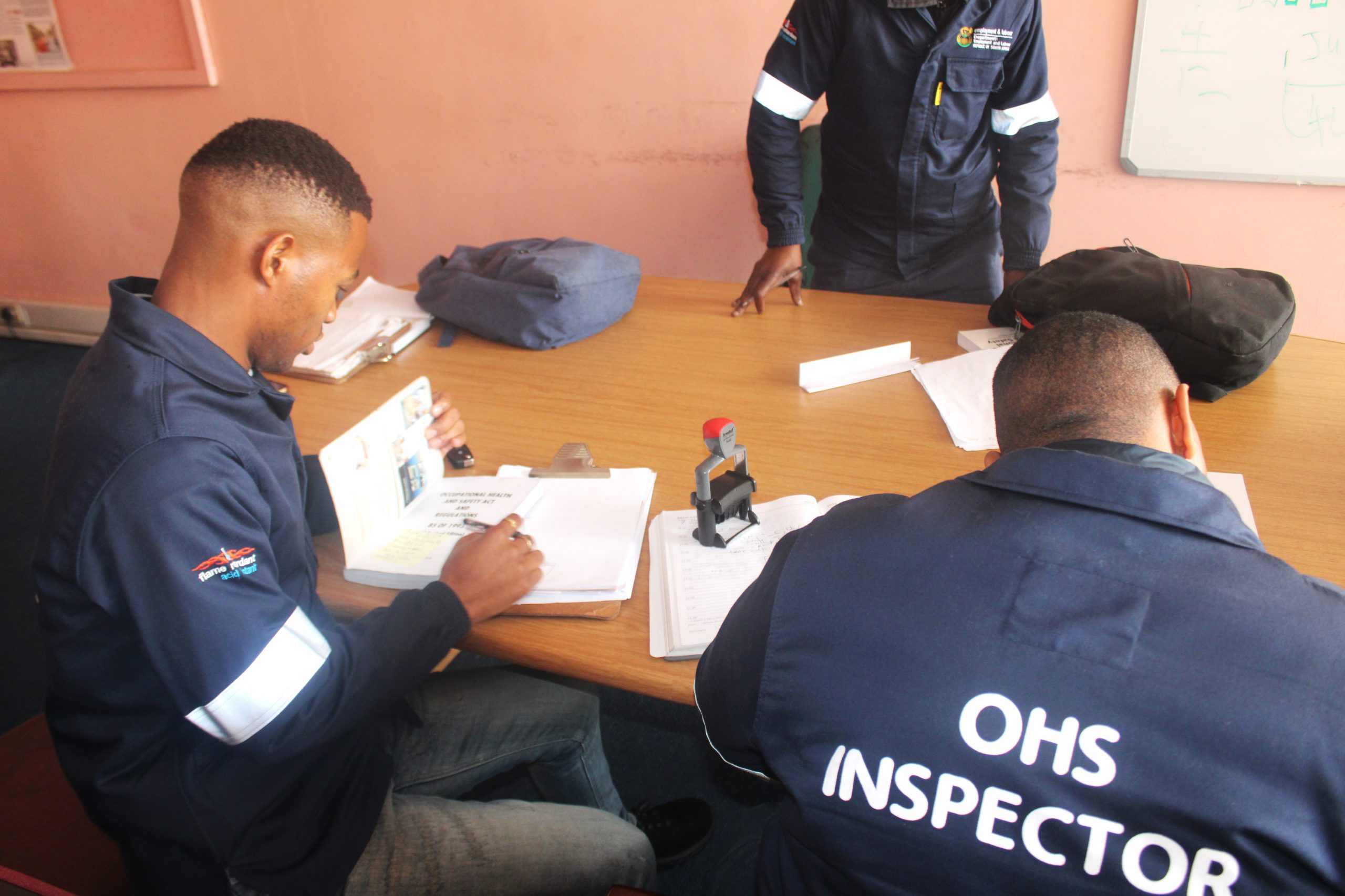 Employment and Labour Department inspectors conducting inspections at one of Makana Municipality's recently condemned buildings. Photo: Luvuyo Mjekula