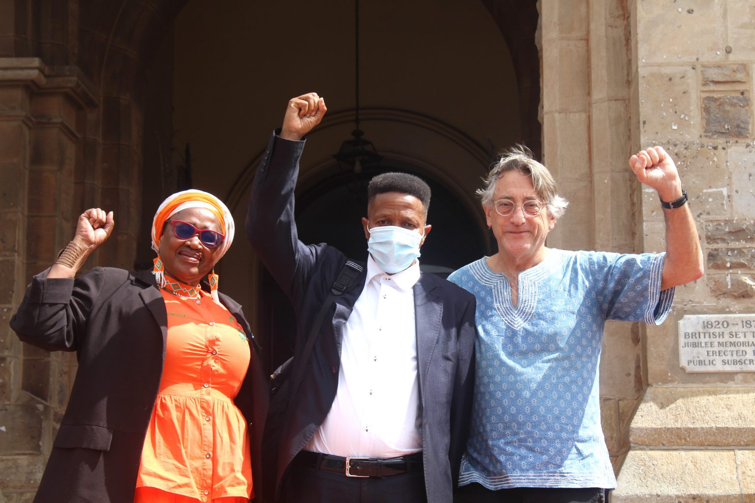 Victorious councillors of the Makana Citizens Front (MCF) celebrate outside the City Hall after being officially reinstated into their positions on Thursday. Photo: Luvuyo Mjekula