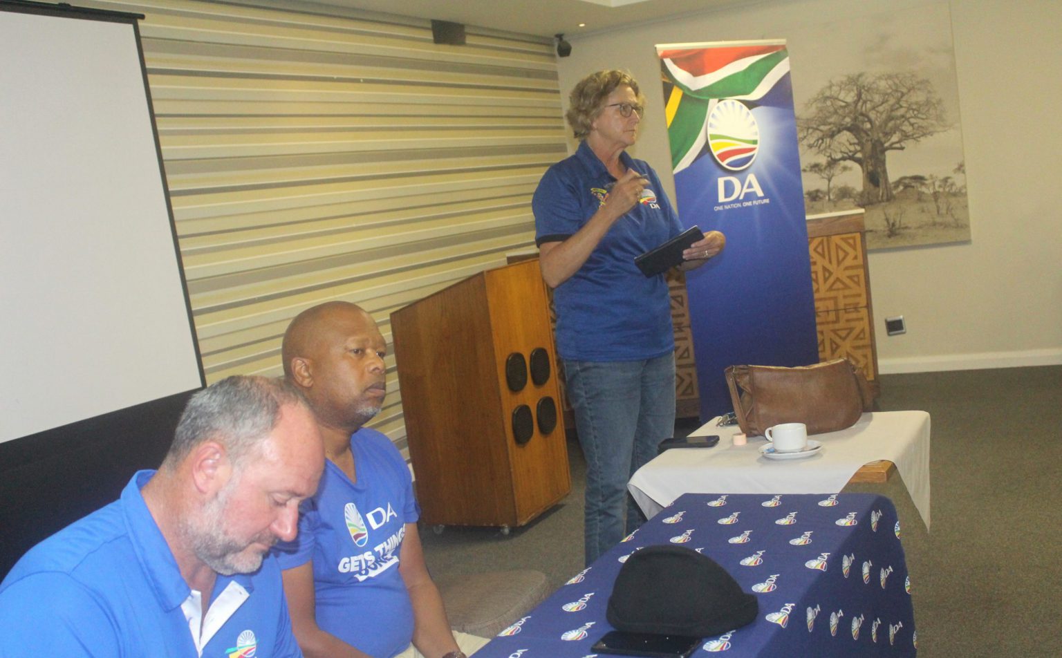 DA shadow MEC for Cooperative Governance and Traditional Affairs (Cogta) Retief Odendaal (left), DA councillor in Makana, Luvuyo Sizani, and Frontier Constituency leader, Jane Cowley, at a public meeting at Graham Hotel in Makhanda on Tuesday. Photo: Luvuyo Mjekula