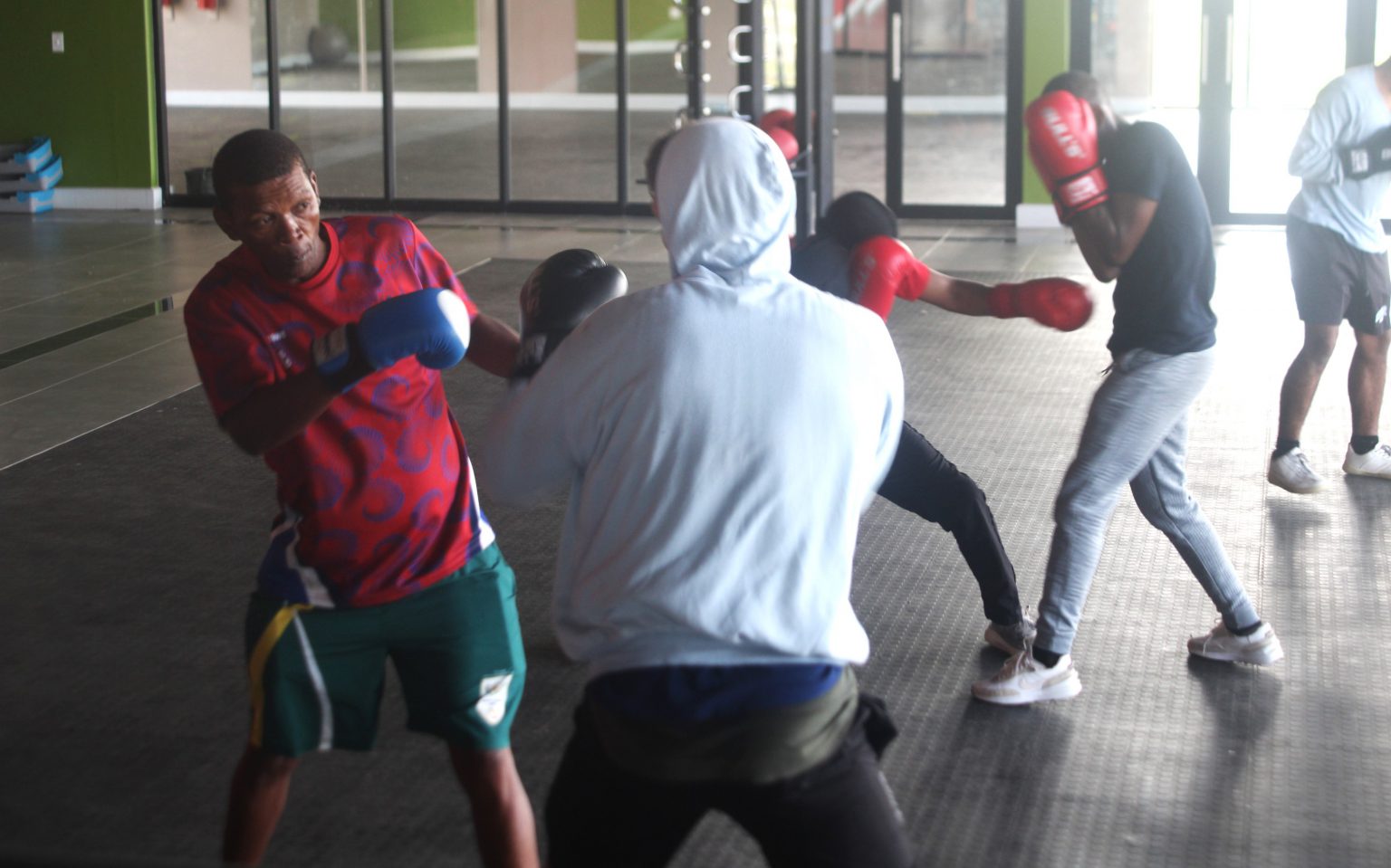 Joint training sessions touted to boost standard of local boxing RU Coach Luyanda "Tyson" Dibela (left) teaching young boxers skills at the Joza Indoor Sports Centre. Photo: Chris Totobela