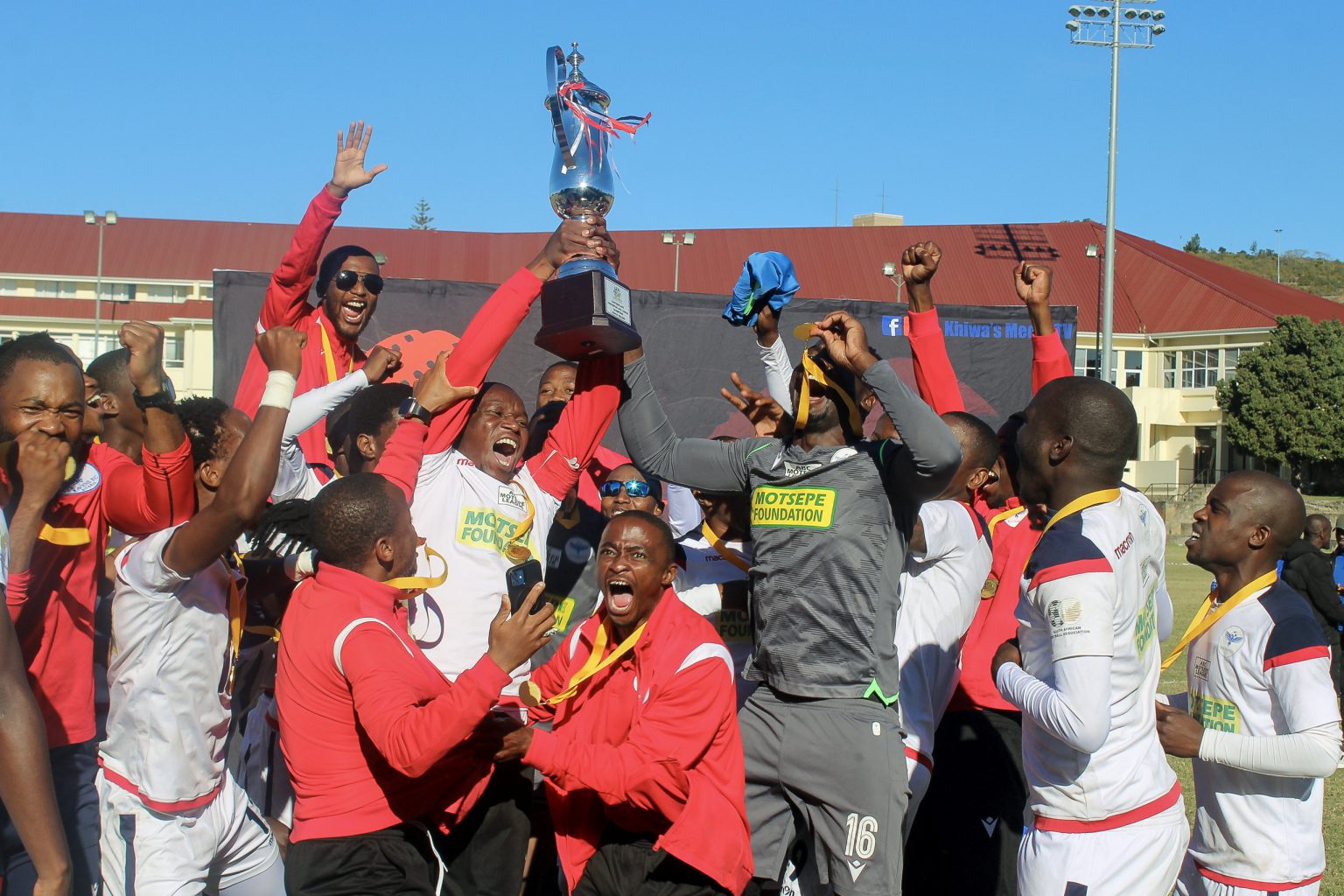 Bhizana’s Ravens win ABC Motsepe championship in Makhanda Ravens FC from Bhizana celebrate after winning the Safa Eastern Cape ABC Motsepe League championship at the Rhodes University fields this past weekend. Photo: Chris Totobela
