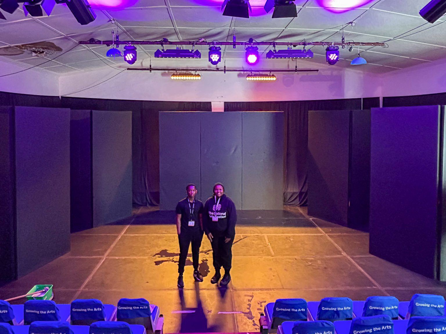 Technicians illuminate the stage like elves in the shoe shop of theatre