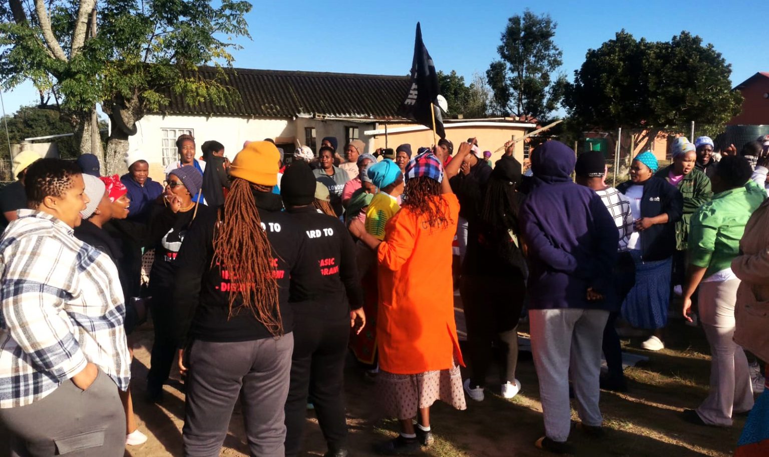 Residents of Seven Fountains protesting against the local school's principal accused of forcing pupils to dispose of her faeces. Photo: Supplied