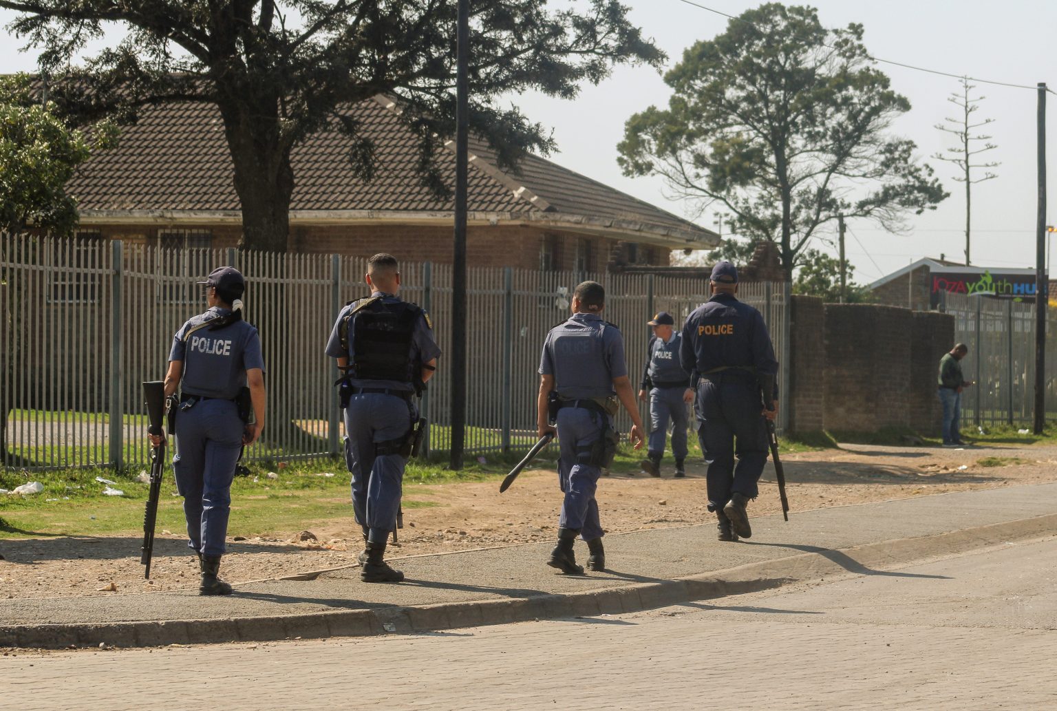 Public order police after dispersing protesting residents in Joza on Sunday. The officers moved to attend to a fire in the Makana Housing building in the area. Photo: Luvuyo Mjekula