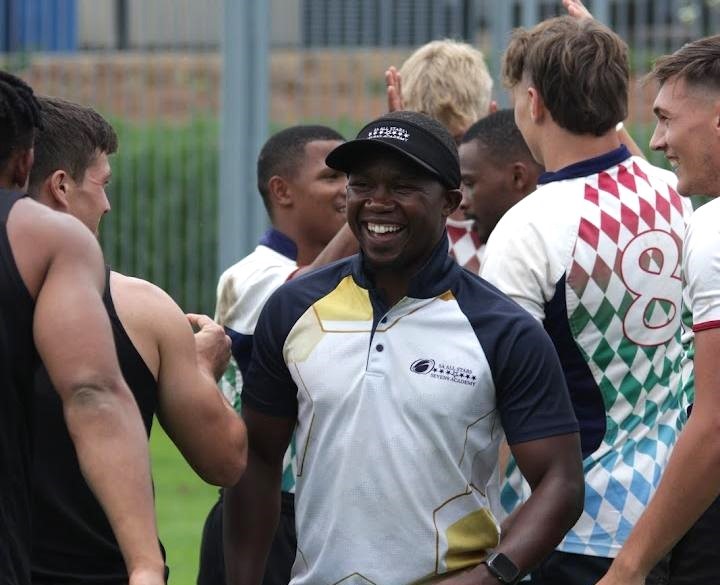 Makhanda rugby star urges youth to choose sport Simamkele Soyeye with his SA All Stars 7s rugby academy players. Photo: Chris Totobela